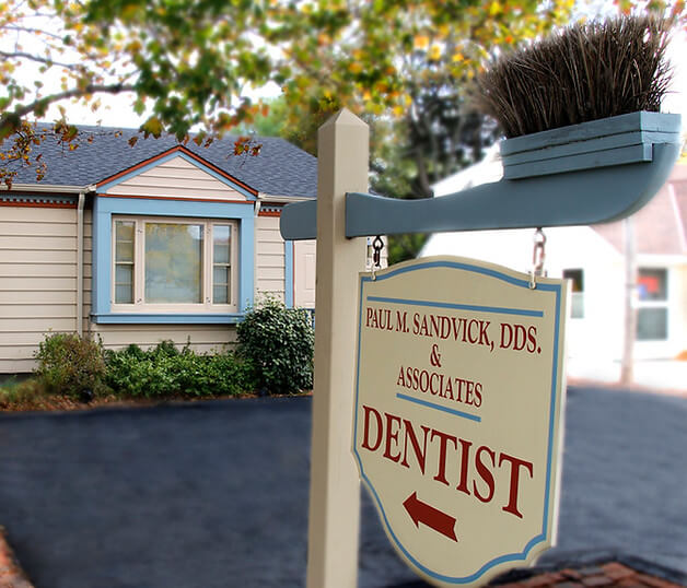 old outdoor sign for Sandvick DDS